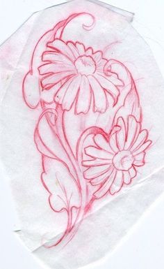 a piece of paper that has some flowers on it and is drawn in red ink