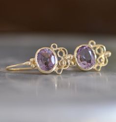 "Unique 14k gold earrings with an oval-faced Amethyst. Handmade beautiful dangle drop earrings, made of 14k yellow solid gold. The light purple Amethyst is shinning with every movement. Amethyst is February birthstone, that makes these earrings a perfect Valentine's day gift :-) You can see a few other gold earrings like this in my shop with a different gemstone, every earring looks unique and special. These earrings are in perfect measurements - not too small and not too big and are easy to dis Elegant Oval Amethyst Earrings, 14k Gold Earrings With Gemstone Accents For Weddings, Elegant 14k Gold Earrings With Gemstone Accents, Elegant Purple 14k Gold Earrings, February Birthstone Jewelry, Dangle Earrings Gold, Gold Dangle Earrings, Aquamarine Earrings, Solid Gold Earrings