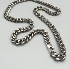 10.5 mm Solid Titanium Chain: Curb link chain made of pure titanium.  100% hypoallergenic, very light weight, durable, comfortable for everyday wear. Size:10.5 mm x 650 mm Two different clasps is Panlong clasp and 8 clasp. Clasp 1: Steel panlong Clasp Clasp 2:Titanium 8 Clasp (inside spring is steel) Gunmetal Cable Chain Link Necklace, Gunmetal Box Chain Stainless Steel Necklace, Gunmetal Stainless Steel Box Chain Necklace, Gunmetal Link Chain Necklace In Stainless Steel, Stainless Steel Chain Necklace, Style Necklace, Stainless Steel Chain, Chain Styles, Hair Jewelry