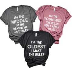 Unisex fit Fits large/roomy. You may consider sizing down unless you don't mind a slightly generous/oversized fit. Available in multiple colors 3 design options Each shirt sold separately SEARCH TERMS: I'm the oldest I make the rules, I'm the middle I'm the reason we have rules, I'm the youngest the rules don't apply to me, Sibling shirts Trendy Cotton Shirt With Funny Text, Basic Cotton Tops With Custom Text, Trendy Custom Text Cotton T-shirt, Relaxed Fit Cotton Tops With Custom Text, Casual Cotton Tops With Custom Text, Family Matching Cotton Tops With Custom Text, Casual Shirt With Custom Text And Relaxed Fit, Oldest Middle Youngest, Funny Sibling Shirts