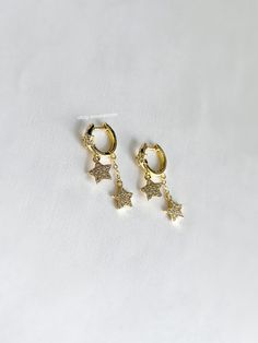 These starry hoops are so stunning on and match everything. An absolute essential in every jewelry collection. - Brass hoops + stars - Comes with one pair (2 earrings total) Gift Ideas Birthday, Drop Hoop Earrings, Dangle Hoop Earrings, Brass Hoops, Astrology Gift, Sparkly Earrings, Ideas Birthday, Jewelry Lookbook, Gold Star