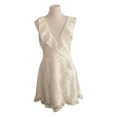 Sleeveless White Dress. It Cresses On The Chest And Has A Lace Pattern Throughout. Brand New! 32.99 Is The Original Price! Fitted Sleeveless Lace Sundress, Sleeveless Lace Mini Dress For Day Out, Fitted Lace Sleeveless Sundress, Sleeveless Lace Mini Dress For Brunch, Sleeveless Lace Sundress, Chic Sleeveless Lace Sundress, Chic Lace Sleeveless Sundress, Sleeveless Lace Sundress For Brunch, Sleeveless Lace Dress For Brunch