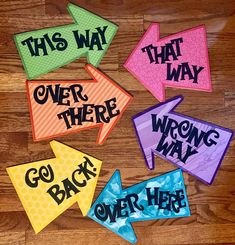 colorful speech bubbles with words that say,'this way over there go back here '