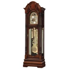 an antique grandfather clock with pendulums on the front and sides, isolated against a white background