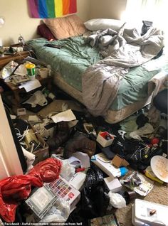 a messy bedroom with clothes scattered all over the floor