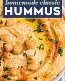 hummus in a white bowl with parsley on top and the words homemade classic hummus above it