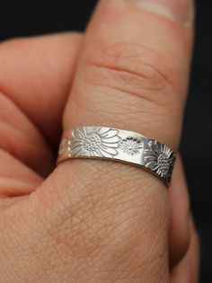 "Copy and paste into your browser, get 15% off ➔ https://bit.ly/VD15OFF Like wildflowers, you must allow yourself to grow in all the places people never thought you would. DETAILS: -Each ring is hand stamped -Ring is 14/20 Gold Filled or Sterling Silver -6mm in thickness You will receive one hand-stamped ring with no enamel filling. **Every item is handmade, this means that each will be unique and may not look EXACTLY like the picture, but it will look very similar ➡ORDER PROBLEMS If there are a Adjustable Stamped Flower Jewelry, Flower-shaped 14k Rings For Anniversary, 14k Flower Shaped Anniversary Rings, Flower Shaped 14k Stamped Rings For Anniversary, Anniversary Flower Shaped 14k Stamped Rings, Flower Shaped Hallmarked Rings For Anniversary, Flower Shaped Hallmarked Anniversary Ring, White Gold Flower Jewelry For Promise, Flower Shaped Sterling Silver Engraved Ring