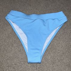 Never Worn High Waist Blue Swimwear For Swimming, Blue Stretch Swimwear For Pool, Light Blue Beachwear Bottoms For Pool, High Waist Blue Swimwear For Beachwear, Light Blue Stretch Swimwear For Pool, Light Blue Bottoms For Pool And Beach Season, Blue High Waist Swimwear For Summer, Blue Stretch Bottoms For Poolside, High Waist Blue Swimwear For Summer