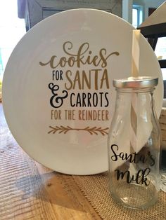 there is a glass jar next to a plate with the words cookies for santa and carrots for the reindeer