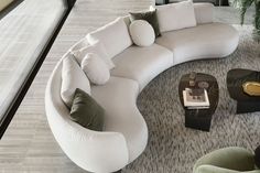 Receive grand and opulent functionality and style with the Amalfi XL curved sectional sofa from Nicoline Italia. The sensual shapes of this seating solution still evoke the admirable sensibilities of 70s aesthetics but are expanded upon with a more prominent silhouette. Curved beautifully, it makes an incredible addition to the center of the living room. Pairing a coffee table, armchairs, and the like is simple with its compliant personality. Sit or lounge easily with enough open space for se Curved Sectional Sofa, Circle Sofa, Curvy Sofa, Curved Couch, Funky Living Rooms, Italian Furniture Modern, Curved Sectional, Luxury Italian Furniture, Modern Sofa Living Room