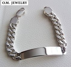 "ID CURB MEN'S 925 STERLING SILVER BRACELET Material : Highest Quality Solid 925 Sterling Silver Bracelet width : 0.4\" (10 mm) Weight : 1.96 oz (55 gr.) We will ship WorldWide. The order will be shipped by REGISTERED AIR MAIL" Luxury Silver Curb Chain Bracelet, Classic Engraved Cuban Link Jewelry, Classic Sterling Silver Bracelet With Curb Chain, Luxury Silver Bracelets With Curb Chain, Luxury Silver Bracelet With Curb Chain, Modern Sterling Silver Chain Bracelet With Curb Chain, Modern Sterling Silver Curb Chain Jewelry, Formal Silver Cuban Link Bracelet With Curb Chain, Sterling Silver Cuban Link Bracelet In White Gold