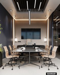 an empty conference room with chairs and a large table in front of a flat screen tv