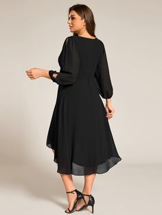 Enhance your wedding guest look with our Plus Size Flowy Long Sleeves V-Neck Waist Applique Midi Chiffon Dress. This dress features a flattering V-neckline and flowy long sleeves for an effortlessly elegant appearance. The delicate waist applique accentuates your figure, while the soft chiffon fabric ensures comfort. Perfect for weddings or any formal occasion, this dress offers a harmonious blend of style and grace. Fit: Please refer to size chart. Length: Midi. Sleeve Style: Long sleeves. Clos Chiffon V-neck Midi Dress For Wedding Guest, Formal Chiffon Midi Dress With Sheer Sleeves, Elegant Chiffon Dress With Sheer Sleeves And V-neck, Formal Midi Dress With Sheer Sleeves, Chiffon V-neck Midi Dress For Wedding, Midi Length Chiffon Wedding Dress, Chiffon Midi Length Wedding Dress, Wedding Midi-length Chiffon Dress, Chiffon Midi Dress For Wedding