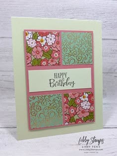 a happy birthday card with flowers on it