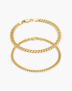 Wrap your wrist in luxury with our gold Cuban Link Bracelet Stack, a showcase of strength and sophistication. The combination of a commanding 5mm gauge and a sleek 3mm design adds a dynamic contrast to this stack. Crafted from premium 925 sterling silver and enduring 14k gold, each link reflects timeless craftsmanship, making this stack an emblem of enduring style and refined masculinity. Gold Cuban Link Bracelet, Gold Bracelets Stacked, Cuban Link Bracelet, Gold Bond, Solid Gold Chains, Silver Shop, Cuban Link, Men's Rings, Pendant Bracelet