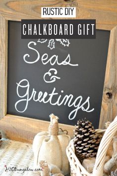 a chalkboard with the words seas and greetings written on it in white lettering