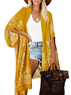 PRICES MAY VARY. Material: This coverup made of very lightweight and breathable fabric,super soft and comfortable Measurements: Length - 37.4in/95cm. Width - 35.4in/90cm,one size fits most, styled in loose-fit,perfect for any body types Design:Open front kimono style,unique mustard yellow boho floral print, airy silhouette with side vents finish an outfit, kimono sleeves complete the look Occasions: The women beach coverup not only suit for vacation,beach and pool wear in summer,also can be a su Coverups Beach, Outfit Kimono, Moda Kimono, Yellow Kimono, Cardigan Summer, Swimsuit Coverups, Kimono Beach Cover Up, Pool Wear, Coverup Swimsuit