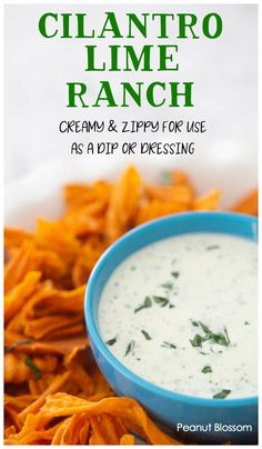 a blue bowl filled with cream and dip surrounded by crispy tortilla chips