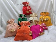 Lot Of 100 Indian Handmade Women's Embroidered Clutch Purse Potli Bag Pouch Drawstring Bag Wedding Favor Return Gift For Guests Free Ship PRODUCT DETAIL :- -------------------------- Product Item : Embroidered Potli Bags Product Line: Rajasthani Ethnic Women Handbag Potli Bags Material -: Fabrics, Beads Occasion: Any Occasion, Festive, Party, Wedding, Bridal PRODUCT DESCRIPTION :- This colorful Clutch Purse with vibrant colors & ethnically designed is a specialty from Rajasthan artisans. India c Elegant Multicolor Pouch For Festivals, Elegant Multicolor Pouch For Festive Occasions, Traditional Potli Bag For Wedding And Festival, Multicolor Handwork Pouch For Celebration, Multicolor Pouch Bag For Wedding, Multicolor Embroidered Bags For Wedding, Multicolor Embroidered Bag For Wedding, Embroidered Red Pouch For Wedding, Elegant Multicolor Pouch For Celebration