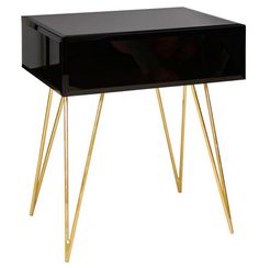 a black and gold side table with two legs