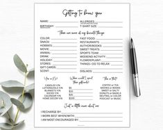 a printable gift list with eucalyptus leaves and pen next to it on a white surface