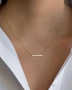 14K solid gold Bar necklace with a tiny diamond , comes in the gold color of your choice, and length of your choice, dainty and absolutely amazing! The perfect everyday necklace, by itself or layered.made in L.A.Length:16'' (if you d like 18'' simply request it in the comment box at checkout )Size: Approx. 1"Diamond: 0.01 ct wt Natural and conflict freeShips in 5 to 7 business daysComes gift ready in our beautiful branded jewelry box. Tiny Gold Jewelry, Minimalist Gold Jewelry Set, Gold T Bar Necklace, Tiny Necklace Gold, Classic Necklaces For Women, Minimalist Diamond Jewelry, Simple Gold Jewlery, Good Necklace Jewellery, Dainty Gold Necklaces