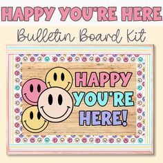 a wooden sign that says happy you're here bulletin board kit with smiley faces