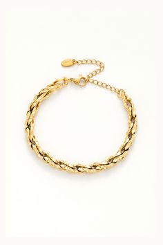 Braided to perfection, this bracelet adds a touch of sophistication to any wrist. Timeless Chain Link Bracelet With Lobster Clasp, Trendy Formal Chain Bracelets, Formal Trendy Chain Link Bracelets, Trendy Jubilee Chain Link Bracelet, Gold Chain Link Bracelets For Party, Formal Metal Chain Bracelet With Adjustable Chain, Elegant Stainless Steel Braided Bracelet For Everyday, Party Gold Chain Link Bracelets, Party Link Bracelets With Gold Chain