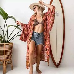 Elevate Your Wardrobe With Our Gorgeous Floral And Paisley Printed Open Style Kimono Wrap. Perfect For Your Next Vaca As It Pairs Well Over A Swimsuit Or A Layered For A Daytime Look. Comes With A Matching Self Tie Sash Style Belt. One Size Fits Most Preorder Ships In Approx. One Week Our Boutique Is Filled With A Curated Collection Of Styles: Spell Gypsy Boho Bohemian Hippie Retro Vintage Handmade Coachella Festival Free People Anthropologie Johnny Was Urban Outfitters Western Aztec Tribal Flor Summer Hippie Pink Kimono, Pink Hippie Kimono For Summer, Bohemian Pink Kimono With Boho Print, Red Bohemian Flowy Kimono, Red Long Sleeve Kimono For Vacation, Summer Red Free Size Kimono, Pink Bohemian Summer Kimono, Red Bohemian Kimono For Beach, Red V-neck Kimono For Summer