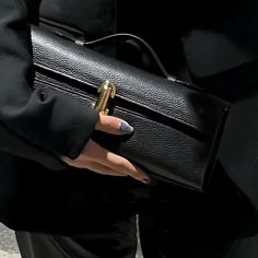 ✨ Elevate your evening look with our Elegant Leather Clutch Bag, the epitome of sophistication and style. Crafted from premium genuine leather, this luxurious small tote combines timeless design with a touch of modern minimalism. Its sleek silhouette is perfect for any night out, adding an effortlessly chic vibe to your ensemble. 💼 Bag Size: 27cm Length x 11cm Height x 7cm Width (10.6" x 4.3" x 2.8") 🌟 Key Features: Material: Genuine Leather 🧵 Top Handle Design: Easy to carry, perfect for both casual and formal occasions. Versatile Styles: Available in Olive Green, Black, and White to match any outfit. Secure Closure: Ensures your essentials are safe while looking stunning. Whether you're heading to a special event or simply stepping out for the evening, this stylish leather handbag wil High-end Business Pouch Shoulder Bag, High-end Clutch For Daily Use As Shoulder Bag, Luxury Handheld Baguette Bag For Office, Luxury Baguette Mobile Phone Bag, High-end Shoulder Bag Clutch, High-end Evening Mobile Phone Bag, High-end Mobile Phone Bag For Evening, Luxury Handheld Clutch For Daily Use, Luxury Evening Baguette Bag Rectangular Case