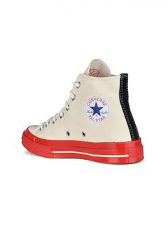 Comme Des Garçons Play x Converse high-top sneakers.Light beige canvas.Signature red heart logo on outer side.Contrasting red patent rubber sole.Round white rubber toe.Lace-up closure.Contrasting seams. Cream High-top Sneakers With Contrast Sole For Streetwear, Retro White High-top Sneakers For Streetwear, High-top Cream Sneakers With Rubber Sole, Cream High-top Sneakers For Streetwear, Retro White High-top Sneakers With Rubber Sole, Cream High-top Sneakers With Gum Sole, Red High-top Sneakers With Rubber Sole For Streetwear, Cream Canvas Shoes With Rubber Sole For Streetwear, Retro Mid-top Sneakers With Red Sole