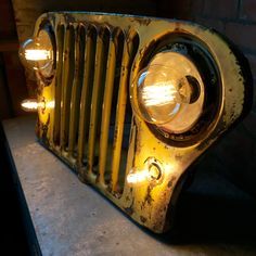 an old yellow radio with some lights on it