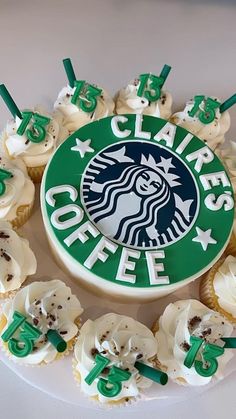 starbucks cupcakes with white frosting and green icing are arranged in a circle