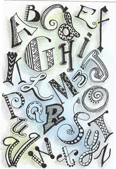 the letters are drawn in black and white with different designs on them, including one that says