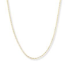 This sleek Singapore chain necklace for her is styled in 14K yellow gold. The 18-inch necklace secures with a lobster clasp. 20 Inch Necklace, Jewelry Education, Jewelry Advice, 16 Inch Necklace, Jared The Galleria Of Jewelry, Yellow Gold Chain, Accessories Jewelry Necklace, Boho Necklace, Cultured Pearls