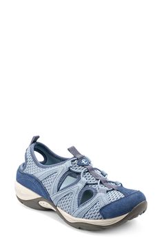 Go the extra mile in this lightweight performance walking shoe featuring a stretchy bungee upper with chic cutout details and a removable contoured footbed. 1 1/2" heel Removable, cushioned insole with arch support Leather and textile upper/textile lining/rubber sole Imported Athleisure Walking Shoes With Arch Support For Outdoor, Blue Sneakers With Arch Support For Walking, Slip-on Walking Shoes With Arch Support For Outdoor Activities, Slip-on Walking Shoes With Arch Support For Outdoor, Sporty Breathable Sport Sandals With Ergonomic Fit, Blue Ergonomic Sneakers With Arch Support, Blue Sneakers With Arch Support, Ergonomic Blue Sneakers With Cushioned Footbed, Ergonomic Blue Sneakers With Arch Support