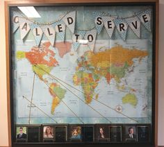 a framed map with pictures of people on it