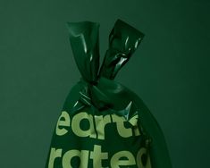 a green bag with the words fortratted printed on it