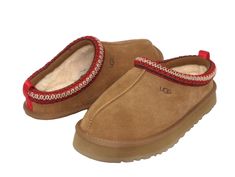 Ugg Tazz Kid /Women Slippers: Suede upper UGG Tasman braid (70% recycled polyester, 30% rayon) 10mm UGGplush 80% upcycled wool, 20% lyocell lining 10mm UGGplush 80% upcycled wool, 20% lyocell insole EVA outsole Textile binding made from 100% recycled polyester fibers 1.5" platform height Heat-embossed UGG logo All items can have a red mark on the size tag. It is to prevent item to be returned in the store and cash out for higher price. The red mark does affect on the quality or appearance of the Red Tasman Uggs, Tazz Ugg, Red Uggs, Burr Basket, Kids Heels, Ugg Tazz, Girly Christmas, Real Christmas, Athletic Clothes