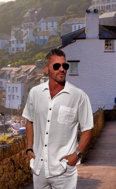 MARTIN Organic Gauze Cotton One Pocket Collar Short Sleeves Mens Shirt . The MARTIN Shirt is handmade constructed with the finest Peruvian Organic Gauze Cotton. Perfect for Summer, Vacation, nautical Sunny Day, Resorts, Relaxing day. Subtle & good looking. The perfect shirt for a Hawaiian getaway or lounging at a luxury Caribbean resort. Add a touch of texture to your wardrobe with this preppy seersucker button-down Shirt. Gauze Texture Fabric. a comfortable, relaxed silhouette. Button-down Mens Capri Pants, Mens Linen Outfits, Caribbean Resort, The Martin, Summer Shorts Outfits, Texture Fabric, Retro Tops, Woman Suit Fashion, Mens Linen