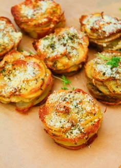 some food that is sitting on top of a piece of paper with parmesan cheese