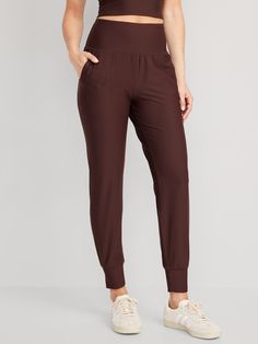 elasticized waistband on-seam hip pockets shirred detail banded cuffs go-dry wicks moisture sits at belly button fitted hip and thigh tapered leg hits just above ankle 26 1/2" regular inseam 24 1/2" petite inseam 30 1/2" tall inseam models are approx.  5'9" and wear sizes s (4), l (12), and xl (18)