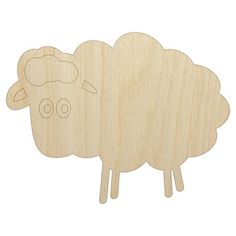 a wooden cutout of a sheep on a white background