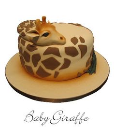 a giraffe cake sitting on top of a plate