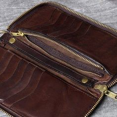 Genuine Leather: Our wallet is made from premium leather, which is equally luxurious as it is long-lasting. Over time your wallet will soften, mold perfectly to your pocket, build character as it ages.   
Hand-rubbed color process creates a unique vintage old effect.This vintage style men's wallet has room for your money, bills, cards, photos etc. 
 
 
 ITEM DETAILS:  
 
 Item Size: 9cm x 18cm  
 Item Type: Long Wallet  
 Material: Genuine Leather  
 Color:   Coffee  
 
 
 
 Great gift ideas for Classic Brown Wallet With Zipper Pocket, Vintage Brown Wallets With Zipper Closure, Vintage Brown Wallet With Zipper Closure, Vintage Brown Wallet With Zipper, Leather Wallet With Zipper Pocket For Daily Use, Classic Rectangular Wallets With Zipper Pocket, Brown Bifold Wallet With Zipper Pocket, Classic Leather Wallet With Zipper Pocket, Brown Leather Trifold Wallet With Zipper Closure