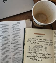 an open bible next to a cup of coffee