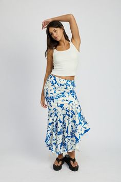 This maxi skirt features an elegant floral design and an asymmetrical ruffle hem, adding sophistication to any outfit. With its maxi length, it provides full coverage for a modest look. Elevate your wardrobe with this stylish and versatile piece! Fabric Contents: 95% Polyester, 5% Spandex. Lining: 100% Polyester Imported Ruffle Hem Skirt, Black Dress Outfits, Denim Sweater, Crop Top Shirts, Hem Skirt, Dresses By Length, Jumpsuit Shorts Rompers, Puffed Sleeves Dress, Asymmetrical Design