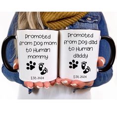 two coffee mugs with the words, promote from dog mom to human mommy on them