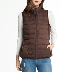 Jodie Womens Puffer Vest By Alpine Swiss Product Features: 100% Nylon Shell, 100% Polyester Fill & Lining STYLISH – The Jodie womens puffer vest is stylish and versatile. Wear it over T-shirts, long sleeve shirts, button downs, or sweaters for endless combinations of warm and fashionable ensembles. WARM – A down alternative filling makes this vest ultra-lightweight and comfortably warm while allowing your arms to have full range of motion. WATER RESISTANT – The nylon shell construction is durabl Casual Puffer Jacket For Travel, Stretch Nylon Outerwear With Zipper Closure, Versatile Nylon Puffer Jacket For Cold Weather, Casual Brown Nylon Outerwear, Casual Packable Outerwear, Winter Nylon Vest With Zipper Closure, Spring Nylon Puffer Jacket, Lightweight Solid Outerwear For Fall, Nylon Vest With Zipper Closure For Winter