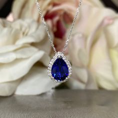 Sleek sellouts! 🤓. Order Blue Sapphire and Moissanite Halo Pendant Necklace, Diamond Halo Pear Shape Blue Sapphire Necklace Blue Sapphire Pendant Gold Necklace #7276 at $650.00 #BlackFridaySale #SapphirePendant #NecklaceBlue #MoissaniteDiamond #SapphireNecklace #HaloPendant #DiamondHalo #GoldNecklace #PearShape #BlueSapphire Sapphire Stone Necklace, Blue Sapphire Drop Necklaces, Pear Shaped Sapphire Necklace As Gift, Blue Sapphire Pendant Necklace, Blue Pear-shaped Jewelry As Gift, Elegant Blue Sapphire Necklace, Elegant Sapphire Gemstone Crystal Necklace, Blue Pear-shaped Jewelry Gift, Blue Pear-shaped Necklace For Formal Occasions